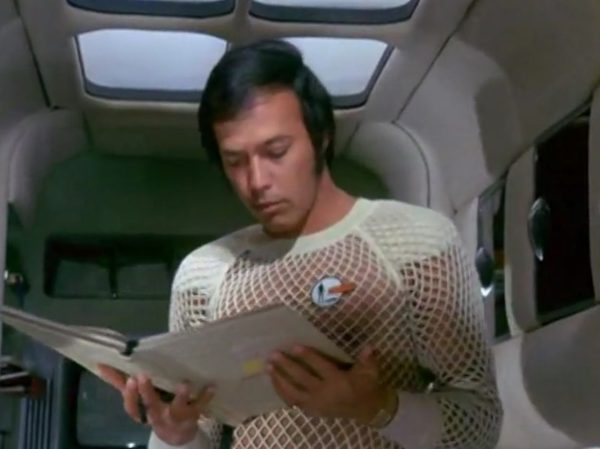 The Gay-Pride Fishnet Uniforms - The string-vest mesh and fishnet shirts worn by the male crew of the Skydiver submarine are a hilarious peak of 1970s fashion.
The Look - The male officers wore tight, completely see-through, sleeveless white fishnet string vests.
The "Sci-Fi" Excuse - The creators claimed the mesh holes allowed the skin to "breathe" in the sweaty, claustrophobic, high-tech environments of a submarine.
The Reality - It looked entirely like modern clubwear or pride festival gear. It was wildly liberal for 1970 network television to show straight male military officers casually walking around looking highly sexualized in see-through mesh.